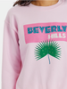 BEVERLY HILLS VINTAGE STUDDED JET-SETTER SWEATSHIRT - PINK